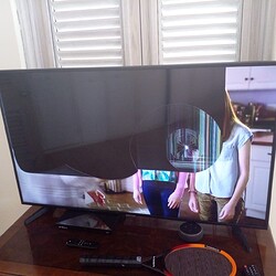 broken TV - hit by orange racket